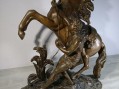 Photo 1 — Statue sculpture régule CHEVAL RETENU PAR UN PALEFRENIER. Coustou ( chevaux de Marly )