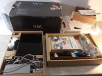 Wii noire en boite pack mario kart.