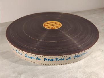 Bobine film 35 mm avec boite plastique la plus grande aventure de tarzan 35mm