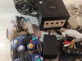 Photo 2 — Lot nintendo console Gamecube n64 et divers manettes jumper pack et alimentations